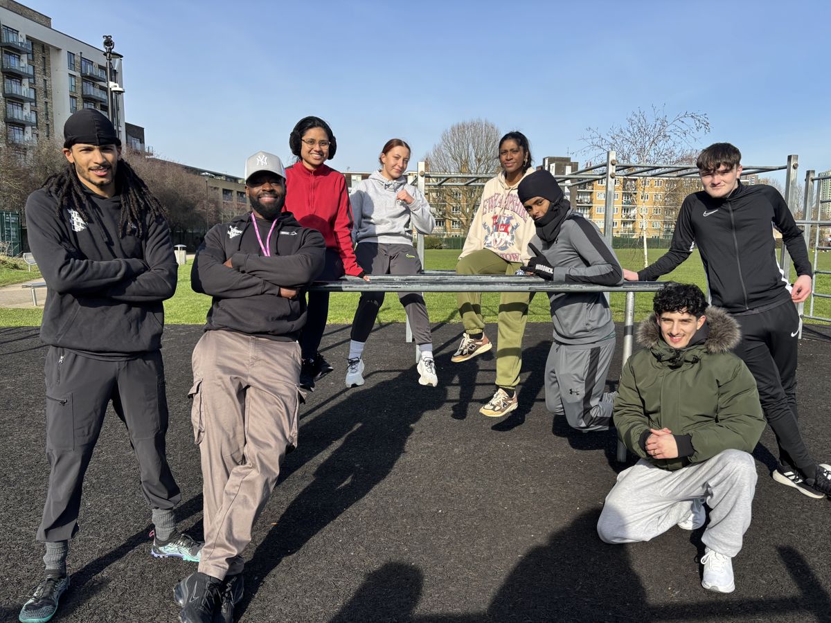 Steel Warriors coaches and young people together at an outdoor session